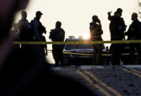 Trump orders new immigration curbs as FBI probes guard shooting